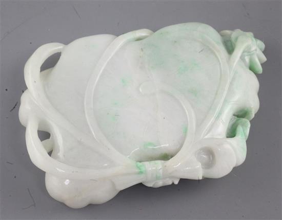 A Chinese jadeite lotus leaf brushwasher, length 15.5cm, tiny chips to a few edges